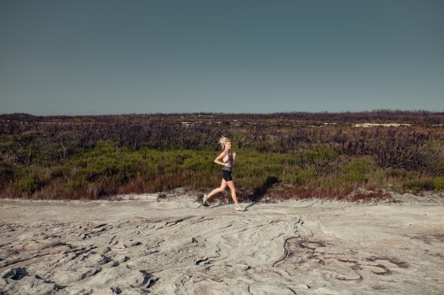 female runner in natural environmen - Australian Stock Image