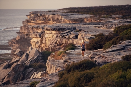 Female runner Morning Cliffside