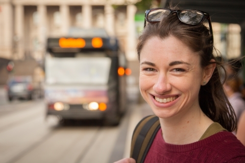 Female Student Waiting for the Tram - Australian Stock Image