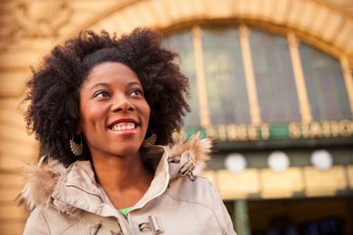 Female Tourist Outside Flinders Street Station - Australian Stock Image