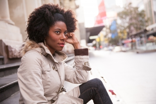 Female Tourist Waiting in Bourke Street Mall - Australian Stock Image