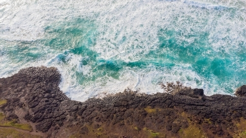 Fingal Head from Above with turbulent waves - Australian Stock Image