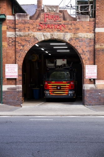 fire truck in fire station, vertical