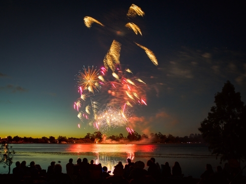 Fireworks by a lake on Australia Day