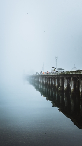 Fishing off a Pier - Australian Stock Image