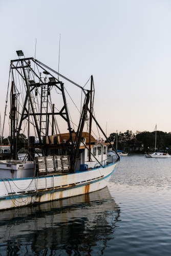 Fishing Trawler on a river - Australian Stock Image