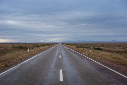 Flinders Ranges road with stormy sky - Australian Stock Image