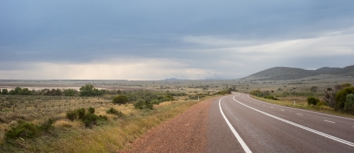 Flinders Ranges road with stormy sky