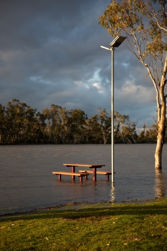 Flooded Murray River picnic table - Australian Stock Image