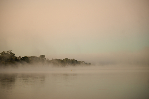 Fog mist morning on river at Mannum - Australian Stock Image