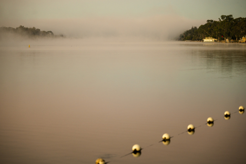 Fog mist morning on river at Mannum - Australian Stock Image