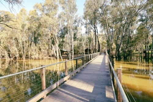 Footbridge walking trail over the Gunbower Creek at Koondrook Victoria Australia - Australian Stock Image