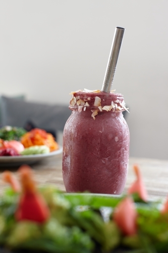 Fresh smoothie and healthy salad ready to eat - Australian Stock Image