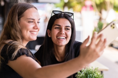friends taking a selfie - Australian Stock Image