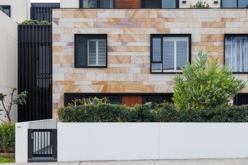 Front of modern sandstone residence - Australian Stock Image