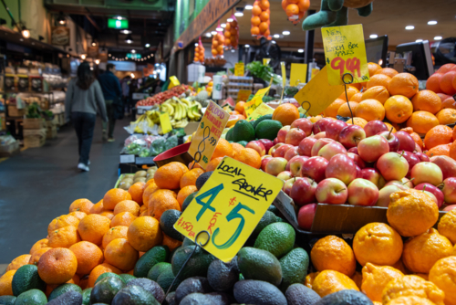 Fruit at Adelaide Central Market with shoppers out of focus - Australian Stock Image