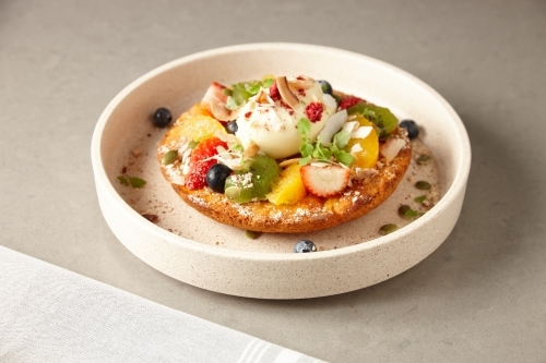 Fruit salad on gluten free bread - Australian Stock Image
