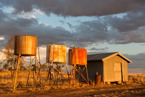 Fuel Bowsers and a shed on a Agricultural Farm - Australian Stock Image