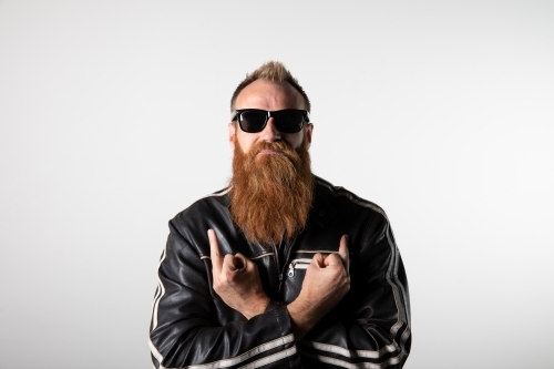 Funky man posing for photographs - Australian Stock Image