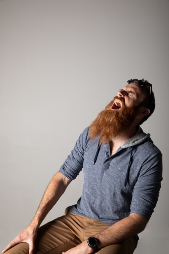 Funky man posing for photographs - Australian Stock Image
