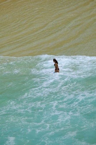 Girl in bikini swimming at South Gorge