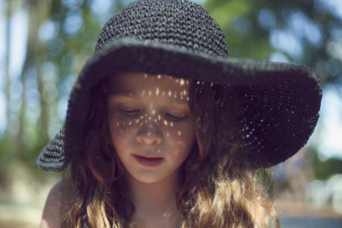 Girl in sunhat - Australian Stock Image