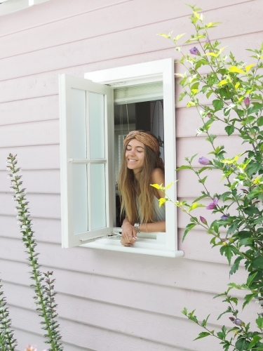 Girl looking out of window