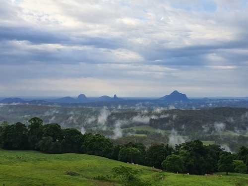 Glasshouse Mountains on a cloudy morning - Australian Stock Image