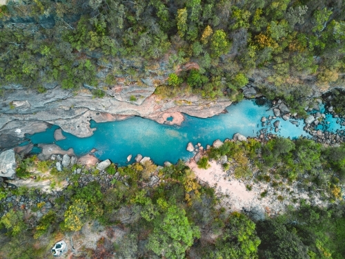 Glenbrook creek meandering gently through the mountain gorge before it enters the Nepean River - Australian Stock Image