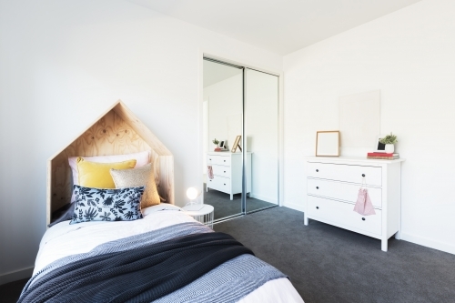 Gorgeous young girl's bedroom beautifully styled - Australian Stock Image