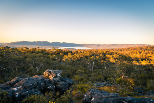 Grampians mountains landscape with native trees viewed towards Wartook Reservoir at sunset, Victoria - Australian Stock Image