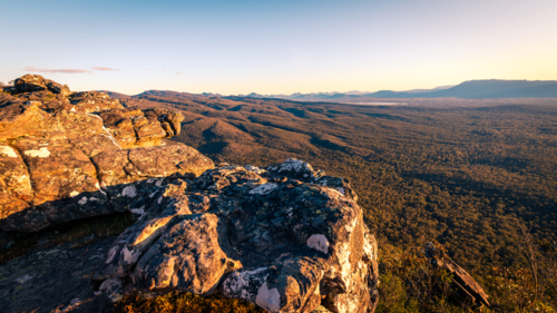 Grampians National Park mountains with ancient rock formations viewed at sunset, Victoria, Australia - Australian Stock Image
