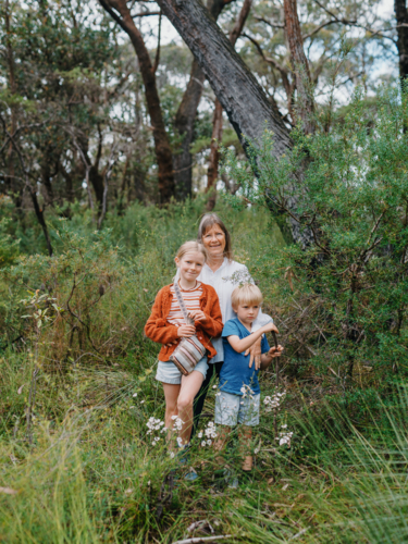 Grandmother enjoying Australian Bushland with her Grandchildren - Australian Stock Image