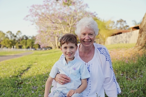 Grandson with grandmother in the park - Australian Stock Image