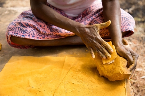 Grinding ochre - Australian Stock Image