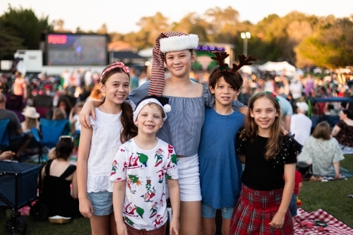 group of 5 children at the Christmas carols