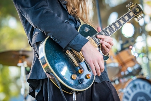 Guitar player at festival - Australian Stock Image