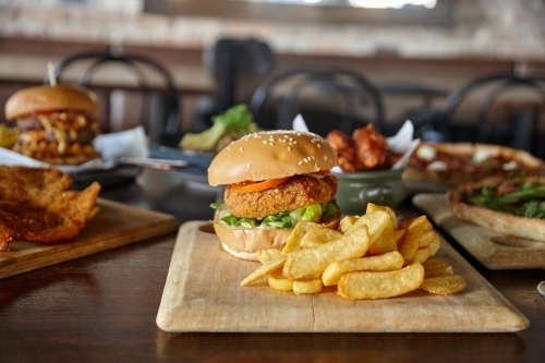 Hamburger lunch meal on table - Australian Stock Image