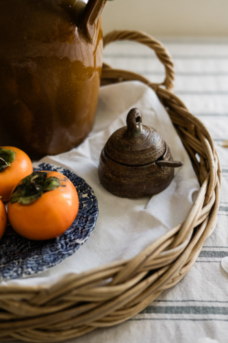 handmade salt pot on a vintage dining table scene - Australian Stock Image