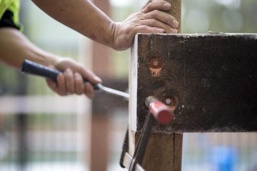 Hands of a tradesman. - Australian Stock Image