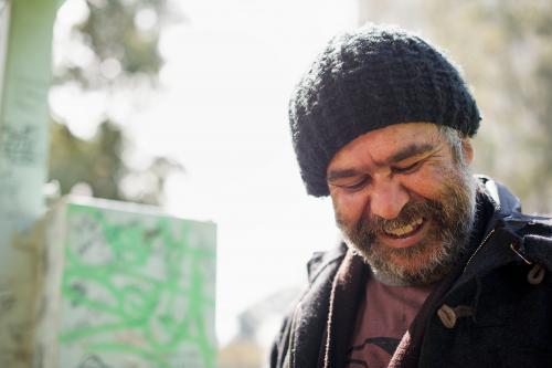 Happy Aboriginal Man in Beanie - Australian Stock Image