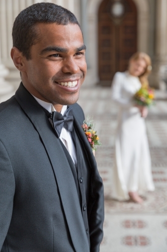 Happy groom grinning - Australian Stock Image
