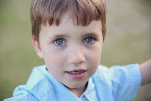 Happy little boy in the park - Australian Stock Image