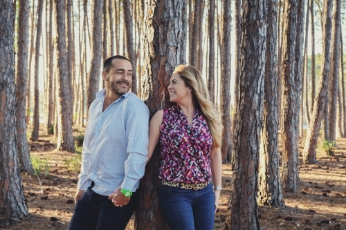 Happy multicultural couples in the wood - Australian Stock Image