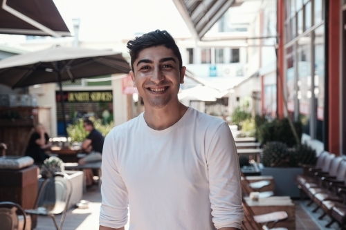 Happy multicultural young adult man - Australian Stock Image