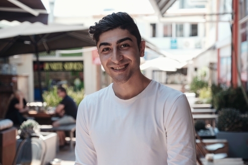 Happy multicultural young adult man - Australian Stock Image