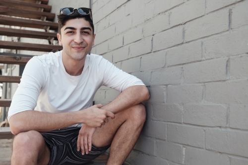 Happy multicultural young adult man, university student - Australian Stock Image