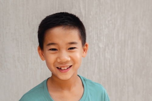 Happy multicultural young boy - Australian Stock Image