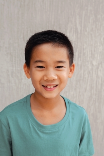Happy multicultural young boy - Australian Stock Image