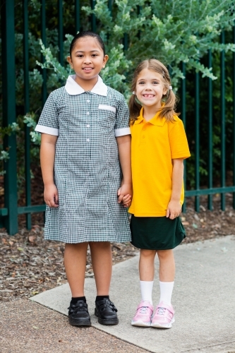happy primary school children outside - Australian Stock Image